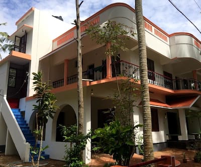 https://imgcld.yatra.com/ytimages/image/upload/t_hotel_yatra_city_desktop/v1441457132/Domestic Hotels/Hotels_Varkala/Arya Villa Heritage/OVER-VIEW.jpg